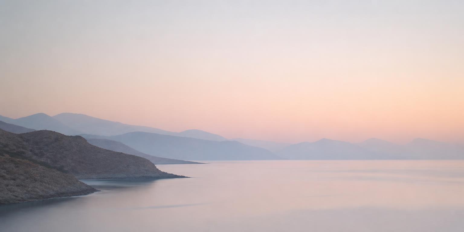 Hazy pastel coastline at dawn